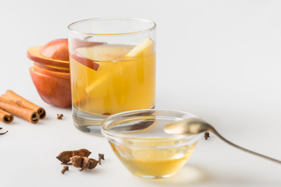 Lukewarm water with apple cider vinegar